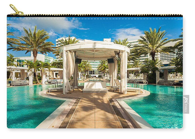 Architecture Carry-all Pouch featuring the photograph Fontainebleau Hotel by Raul Rodriguez