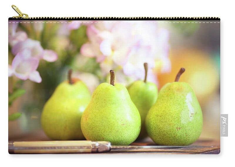Freesia Zip Pouch featuring the photograph Four Green Pears On Wooden Board by Sasha Bell
