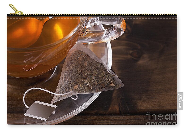 Tea Zip Pouch featuring the photograph Fresh glass cup of tea by Simon Bratt