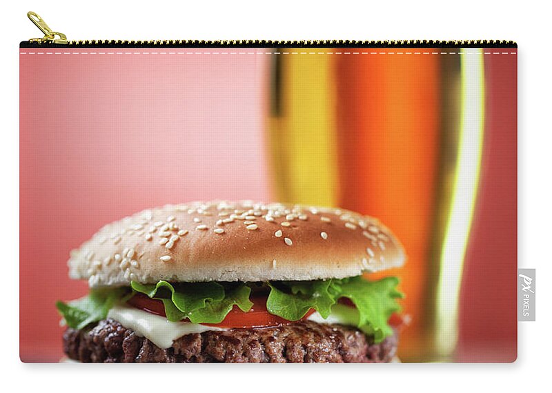 Unhealthy Eating Zip Pouch featuring the photograph Fresh Hamburger With Beer by Svariophoto