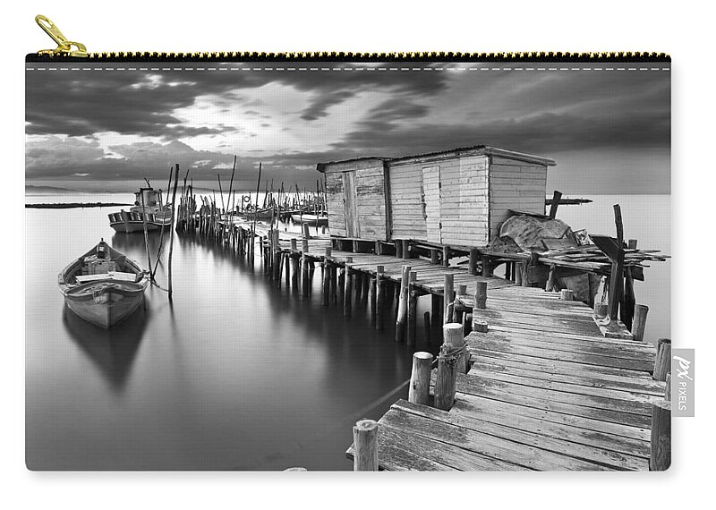 Pier Zip Pouch featuring the photograph Frozen melody by Jorge Maia
