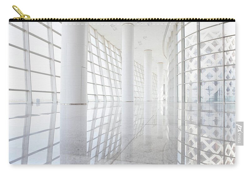 Empty Zip Pouch featuring the photograph Futuristic Office Building by Beijingstory