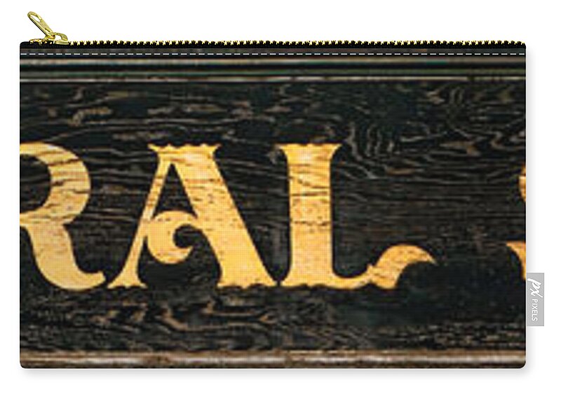 Antique Zip Pouch featuring the photograph General Store Sign by Olivier Le Queinec
