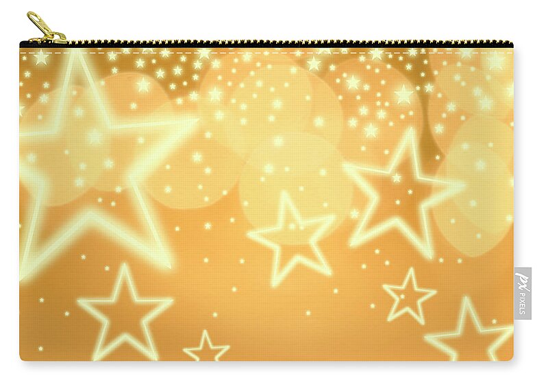 Christmas Lights Zip Pouch featuring the photograph Glowing Background With Stars, Studio by Tetra Images