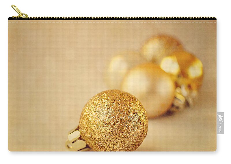 Baubles Zip Pouch featuring the photograph Gold glittery Christmas baubles by Lyn Randle