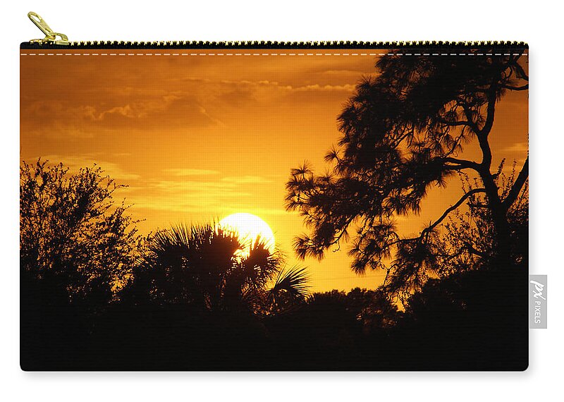 Golden Sun Zip Pouch featuring the photograph Golden Sunset by Chauncy Holmes