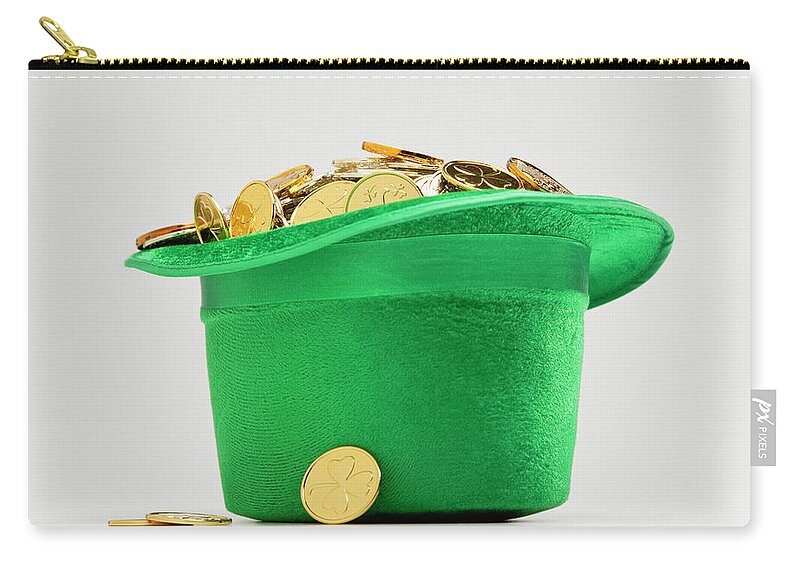 Coin Zip Pouch featuring the photograph Green Hat Filled With Golden Coins by Vstock Llc