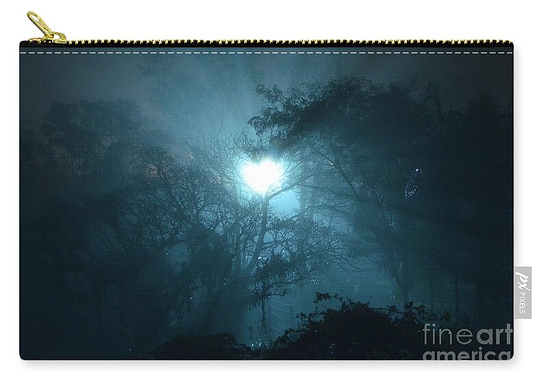 Forest Zip Pouch featuring the photograph Heart of Light on a Foggy Night Sky by Carlos Alkmin