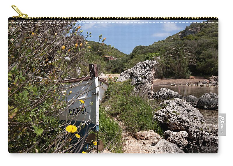 Blue Zip Pouch featuring the photograph hidden caroline - In middle of cales coves menorca is a llaut hidden of curious sights by Pedro Cardona Llambias