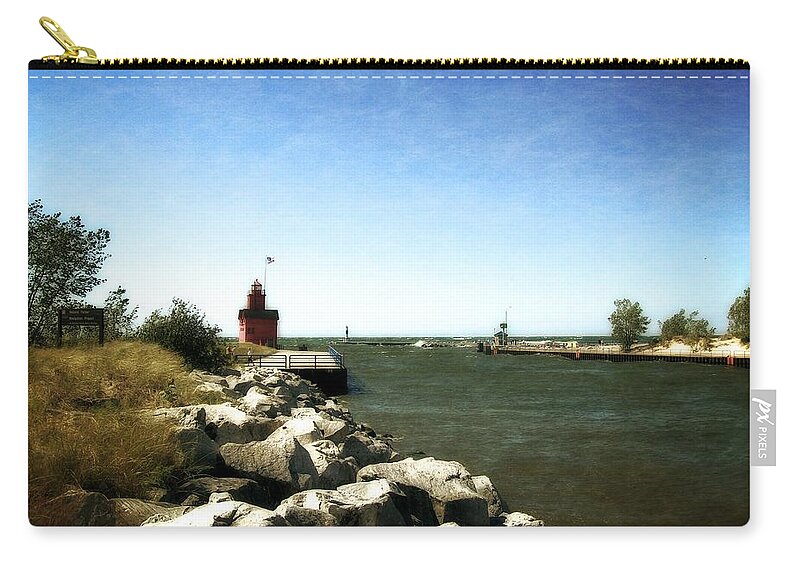 Lighthouse Zip Pouch featuring the photograph Holland Channel and Big Red by Michelle Calkins