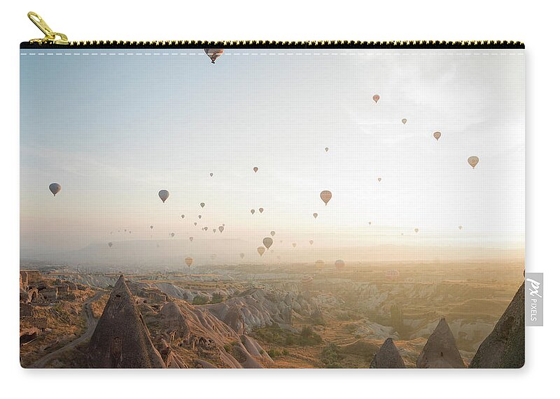 Scenics Zip Pouch featuring the photograph Hot Air Balloons Rise Above Desert by Ascent Xmedia
