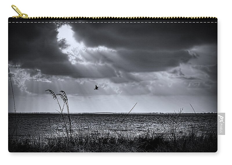 Sunset Zip Pouch featuring the photograph I Fly Away by Marvin Spates