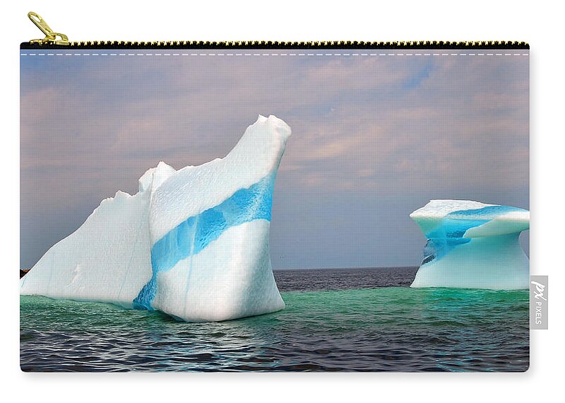 Iceberg Off The Coast Of Newfoundland Zip Pouch featuring the photograph Iceberg off the Coast of Newfoundland by Lisa Phillips