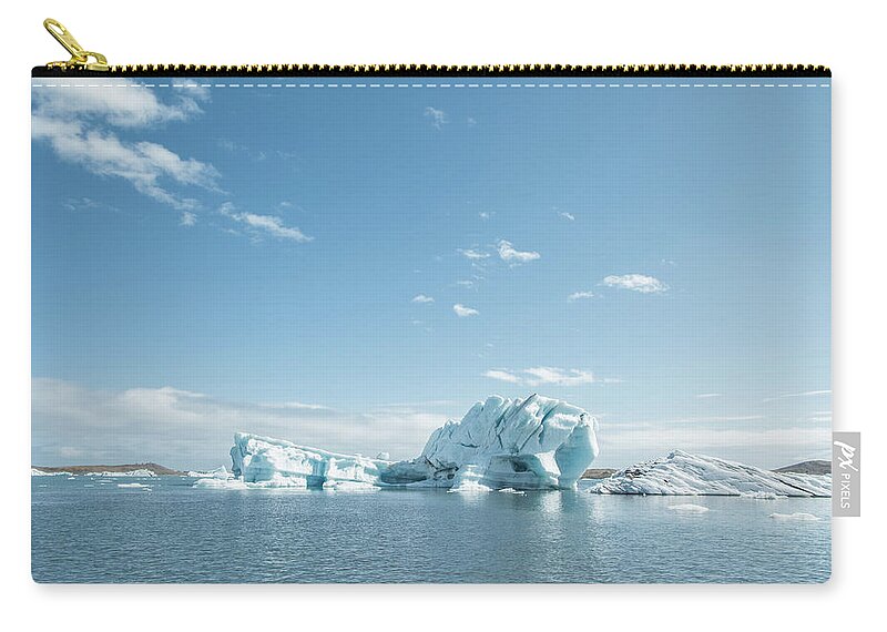 Tranquility Zip Pouch featuring the photograph Iceberg by Oscar Wong