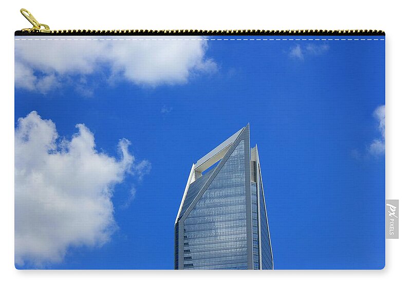 Charlotte Zip Pouch featuring the photograph In the Clouds by Morgan Carter