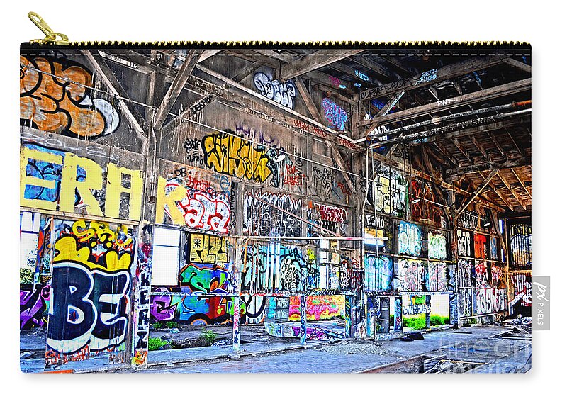 Destroyed Zip Pouch featuring the photograph Inside The Old Train Roundhouse at Bayshore near San Francisco and the Cow Palace V by Jim Fitzpatrick