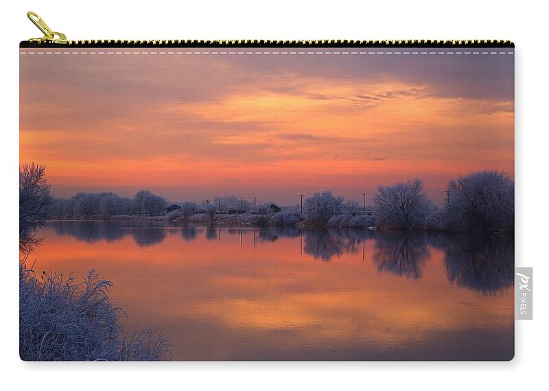 Sunset Zip Pouch featuring the photograph Iridescent sunset by Lynn Hopwood