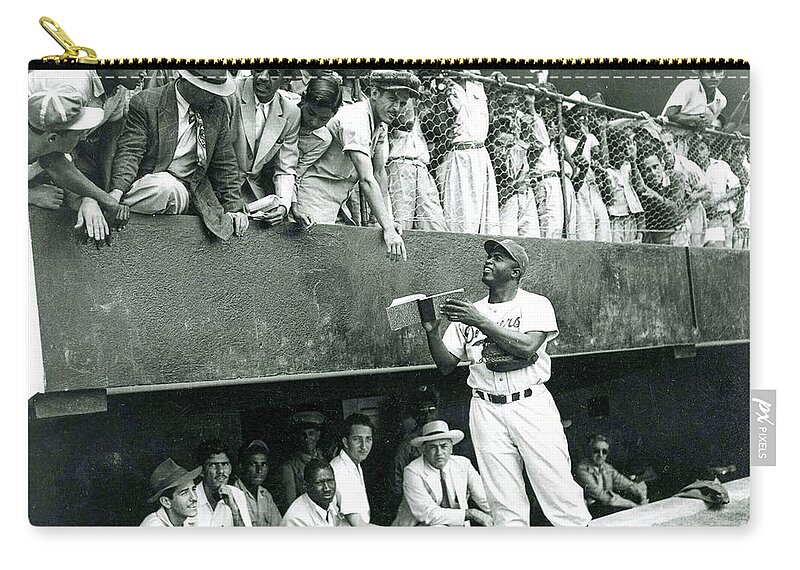 Jackie Robinson Zip Pouch featuring the photograph Jackie Robinson signs autographs vintage baseball by Vintage Collectables
