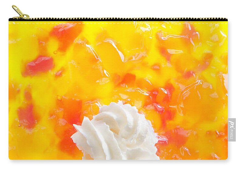 Cream Zip Pouch featuring the photograph Jelly and a big dollop of cream close up photograph by Lenny Carter