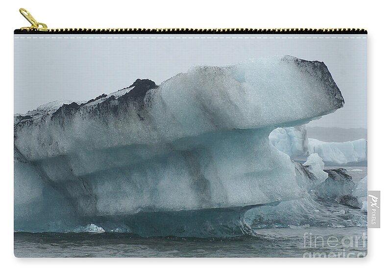 Nature Zip Pouch featuring the photograph broken ice on Joekulsarlon Iceland by Rudi Prott