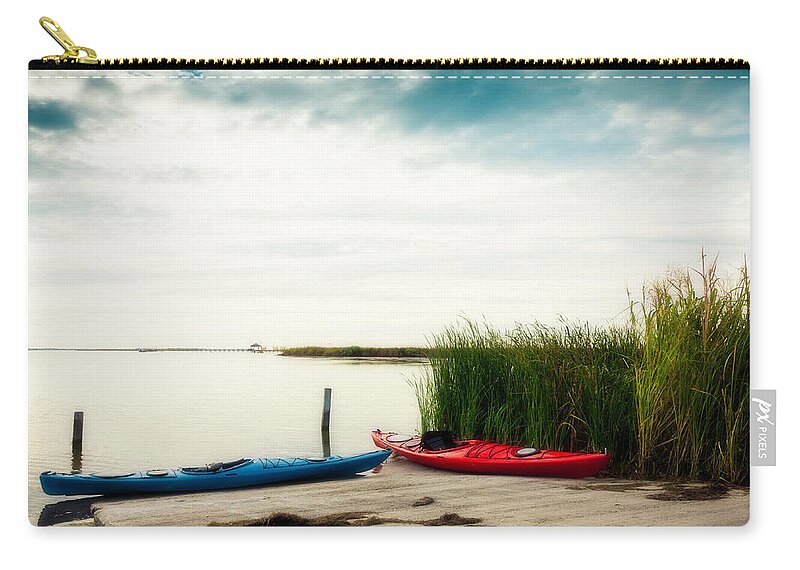 Water's Edge Zip Pouch featuring the photograph Kayaks By Waters Edge by Catlane