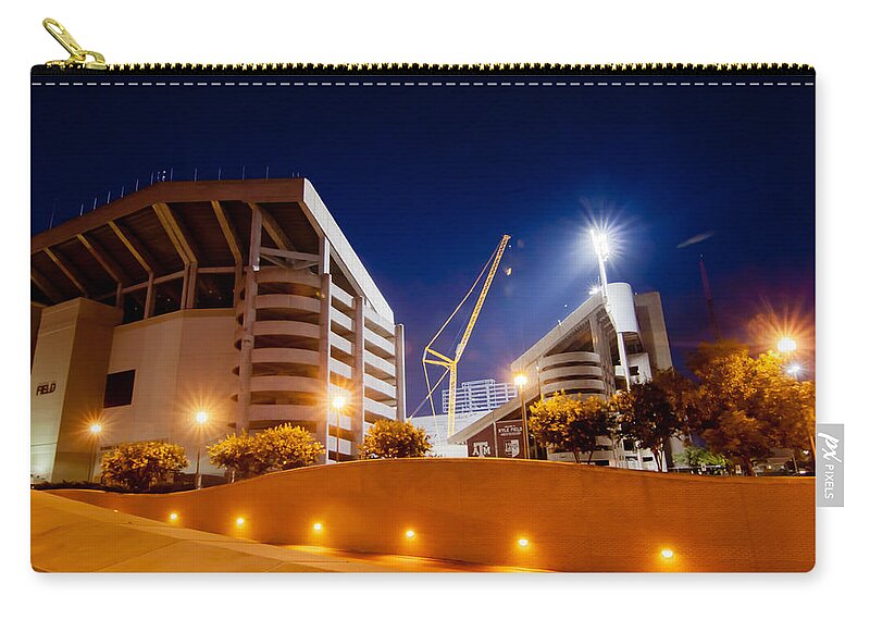 Aggies Zip Pouch featuring the digital art Kyle Field at Night by Linda Unger
