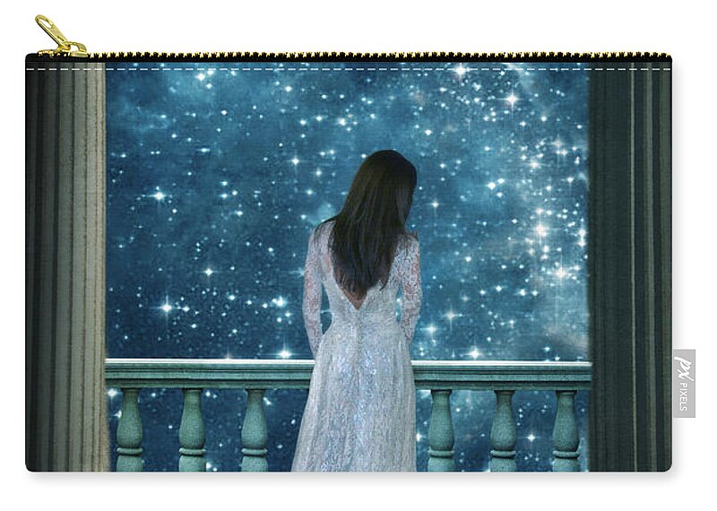 Woman Zip Pouch featuring the photograph Lady on Balcony at Night by Jill Battaglia