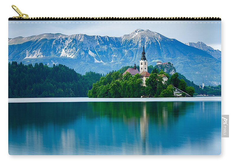 Bled Zip Pouch featuring the photograph Lake Bled Island church by Ian Middleton