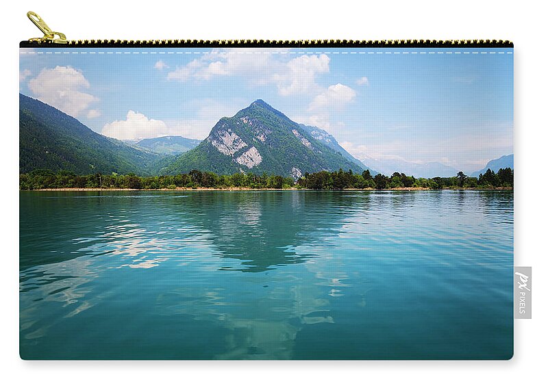 Thun Zip Pouch featuring the photograph Lake Of Thun by Lucynakoch