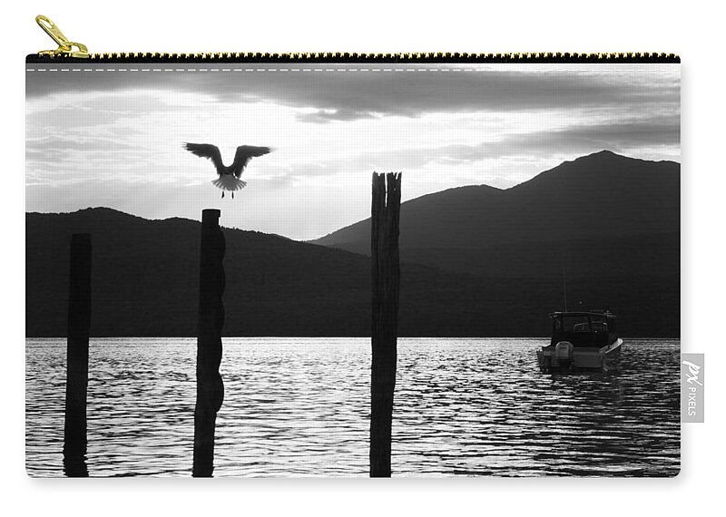 Lake Zip Pouch featuring the photograph Last Flight of the Day by Alexey Stiop