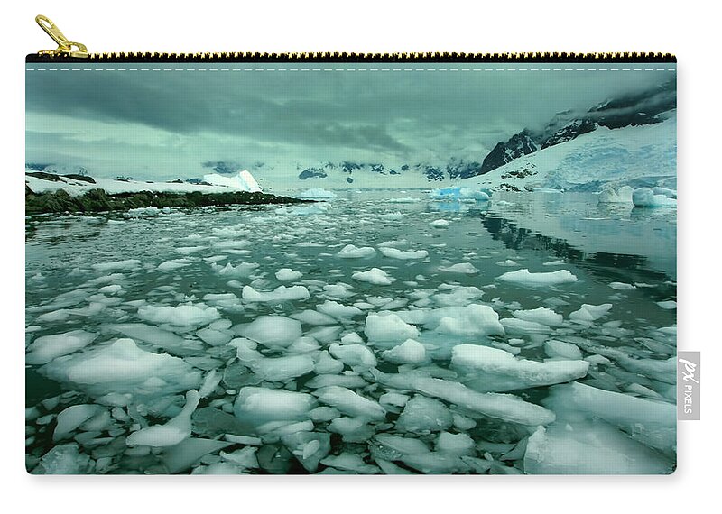 Icebergs Zip Pouch featuring the photograph Spring Ice Melt by Amanda Stadther