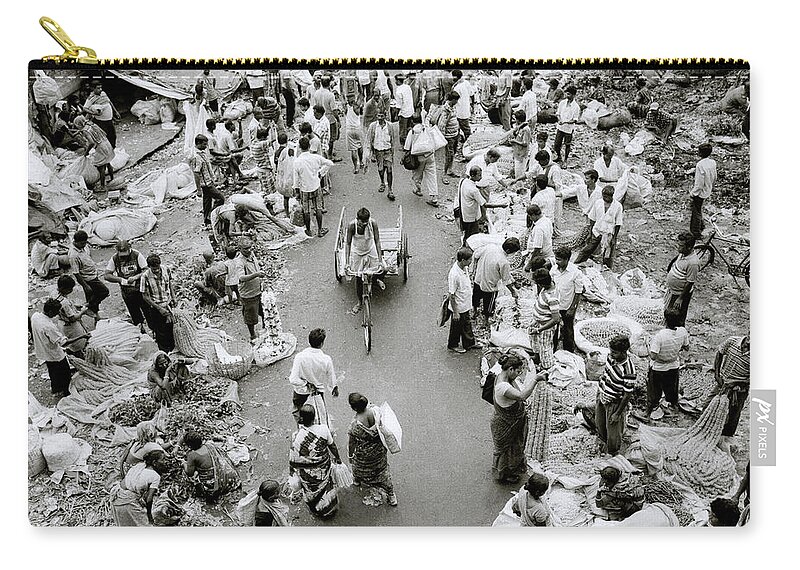 Diversity Zip Pouch featuring the photograph Life In The Flower market In Calcutta by Shaun Higson