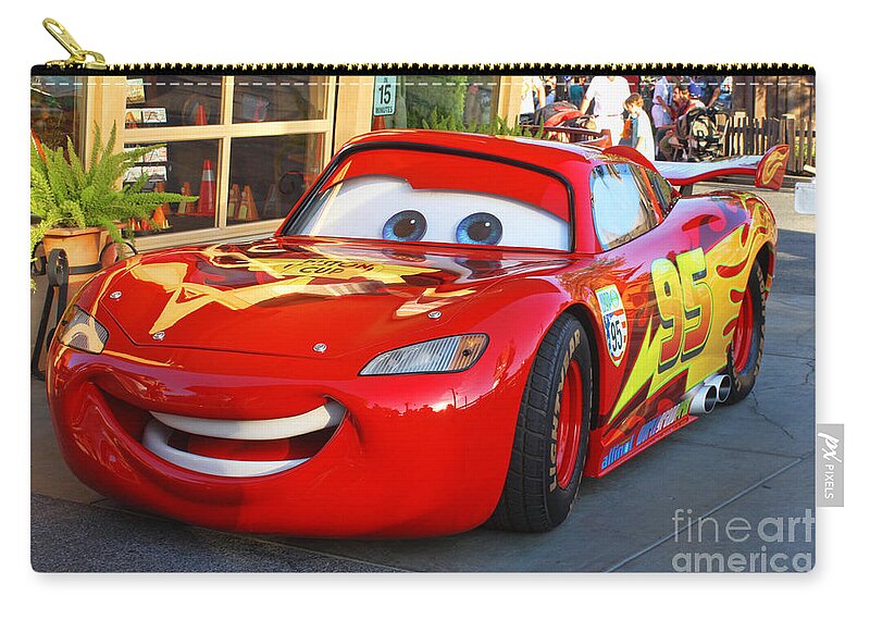 Lightning Mcqueen Zip Pouch featuring the photograph Lightning McQueen by Tommy Anderson