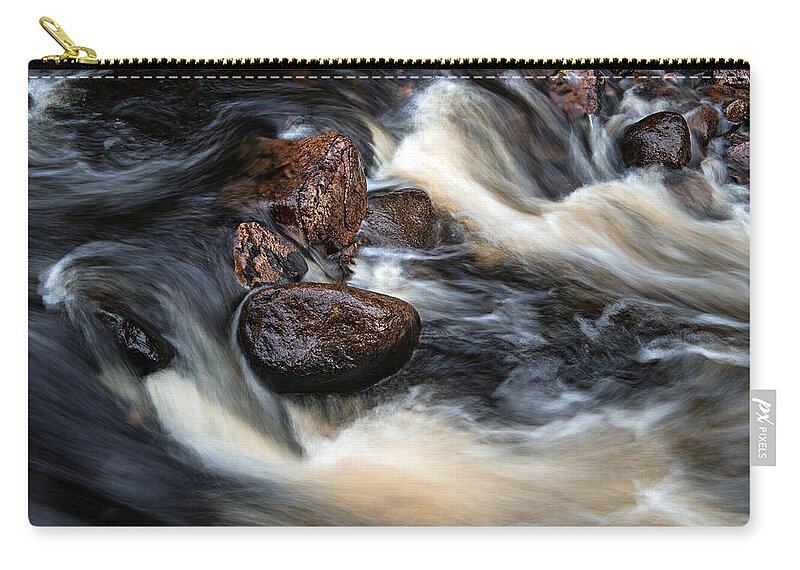 Canada Zip Pouch featuring the photograph Like a Rock by Doug Gibbons