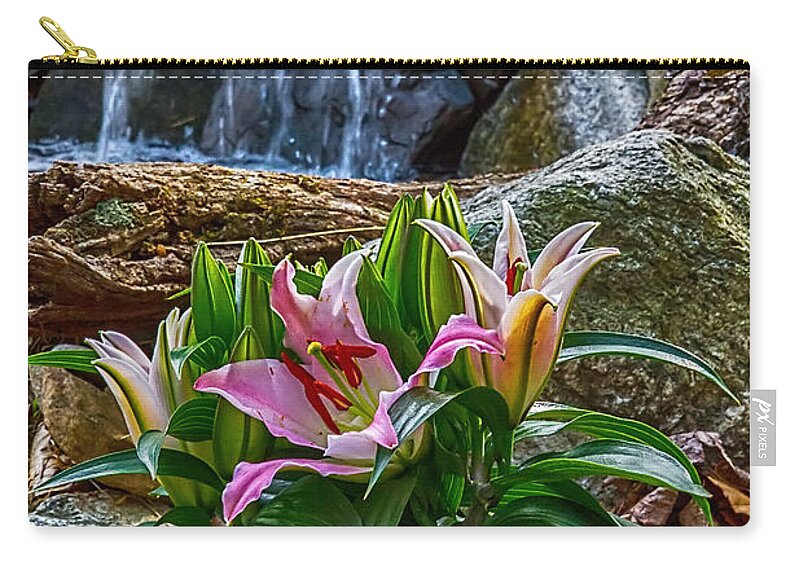 Lily Zip Pouch featuring the photograph Lilies of the Falls by John Haldane