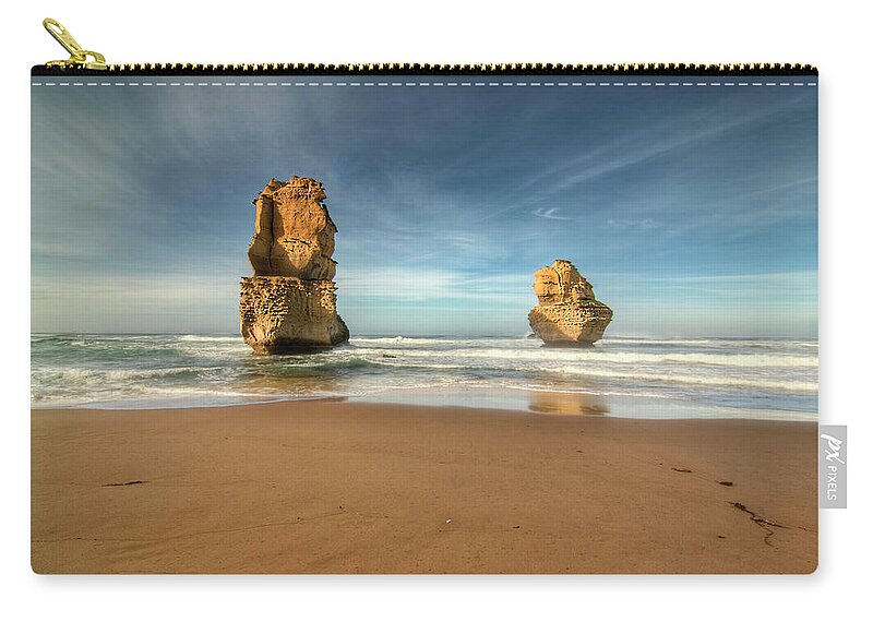 Tranquility Zip Pouch featuring the photograph Limestone Stacks by Photo Art By Mandy