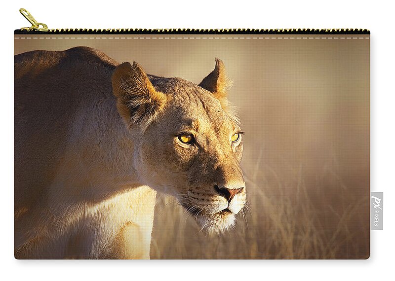 Lion Zip Pouch featuring the photograph Lioness portrait-1 by Johan Swanepoel