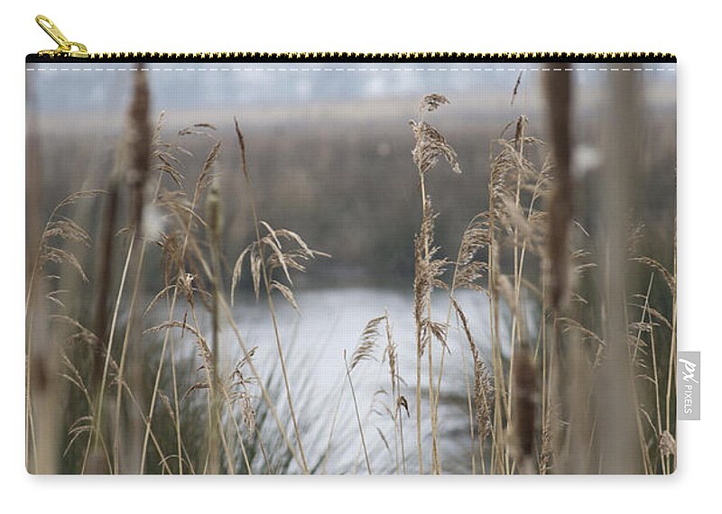 Reeds Carry-all Pouch featuring the photograph Looking through the Reeds by Spikey Mouse Photography