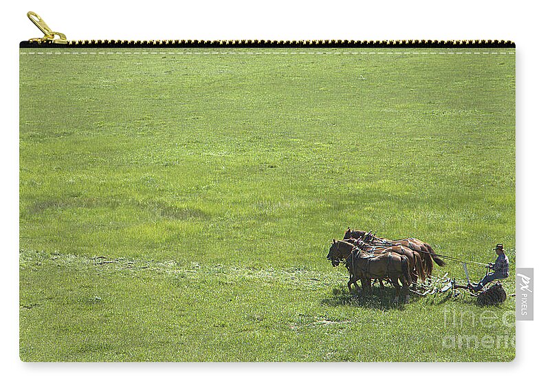 Draft Horse Zip Pouch featuring the photograph Lots Of Green To Plow by Jerry McElroy