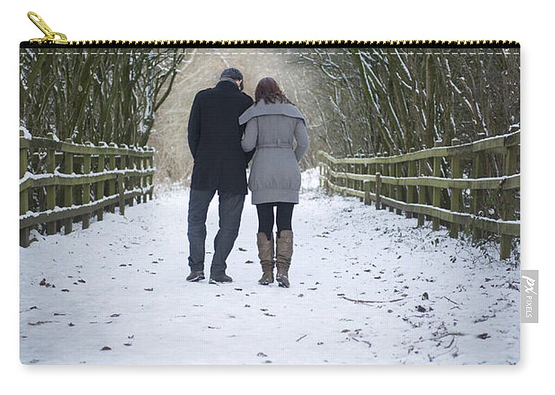 Couple Zip Pouch featuring the photograph Lovers Winter Walk by Lee Avison