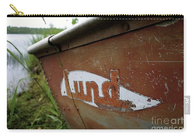 Lunds Zip Pouch featuring the photograph Lund Fishing Boat by Jacqueline Athmann