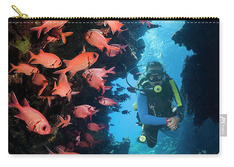 People Zip Pouch featuring the photograph Male Scuba Diver In Cave by Georgette Douwma