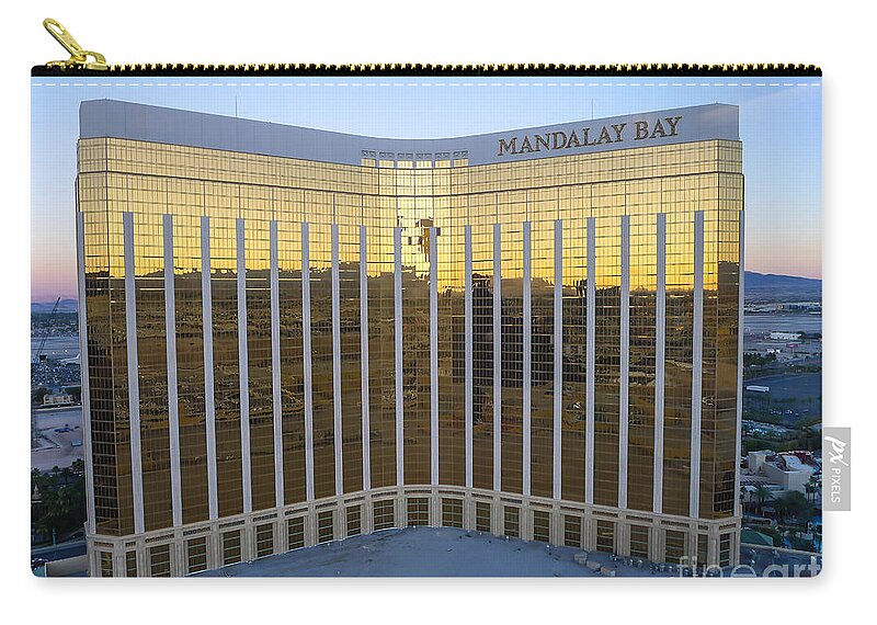 Nevada Zip Pouch featuring the photograph Mandalay Bay Resort and Casino by Edward Fielding