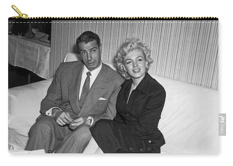 1954 Zip Pouch featuring the photograph Marilyn Monroe And Joe DiMaggio by Underwood Archives