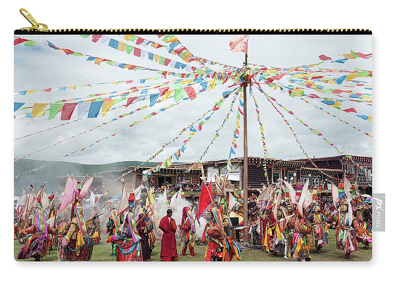 Chinese Culture Zip Pouch featuring the photograph Masked Monks Dancing At A Tibetan by Remote Asia Photo