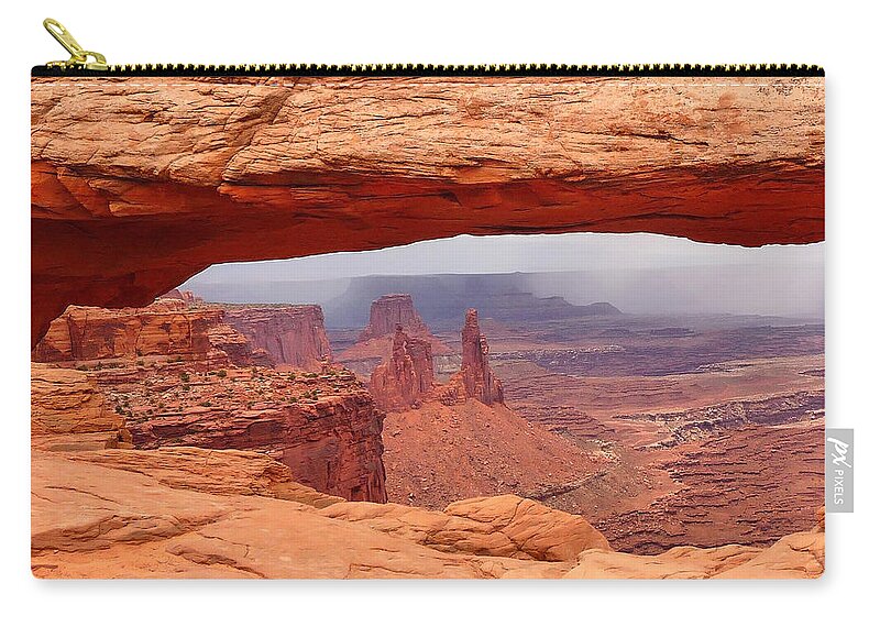 Mesa Arch Zip Pouch featuring the photograph Mesa Arch in Canyonlands National Park by Mitchell R Grosky