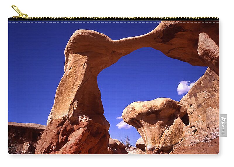 Utah Zip Pouch featuring the photograph Metate Arch Utah by Rich Franco