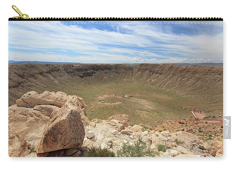 Tranquility Zip Pouch featuring the photograph Meteor Crater by Michele Falzone