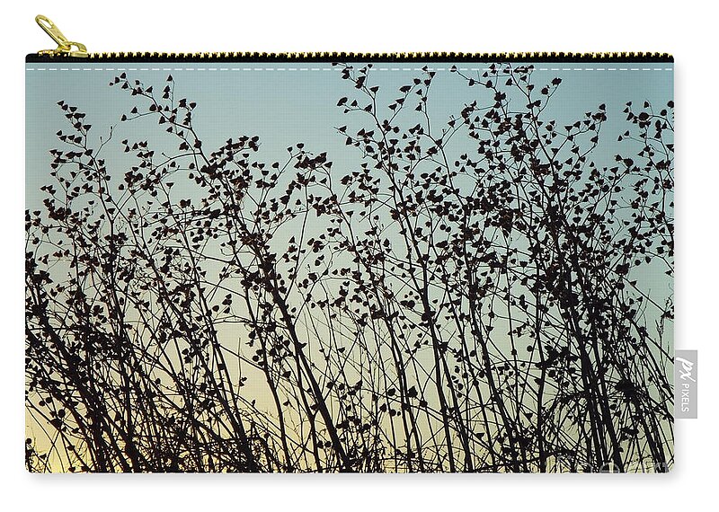 Sunset Zip Pouch featuring the photograph Mid Winter Silhouette by Caryl J Bohn