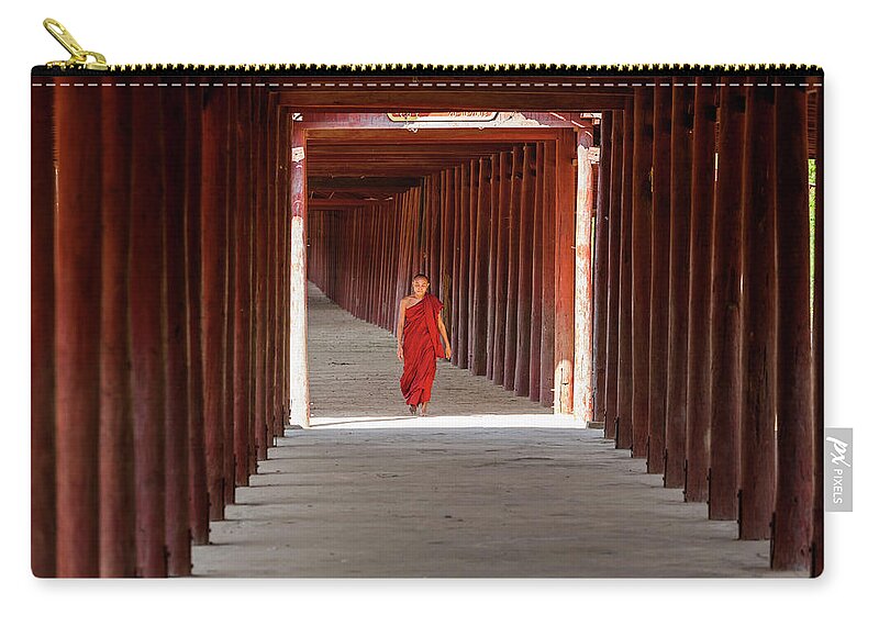 People Zip Pouch featuring the photograph Monk In Walkway Of Wooden Pillars To by Peter Adams
